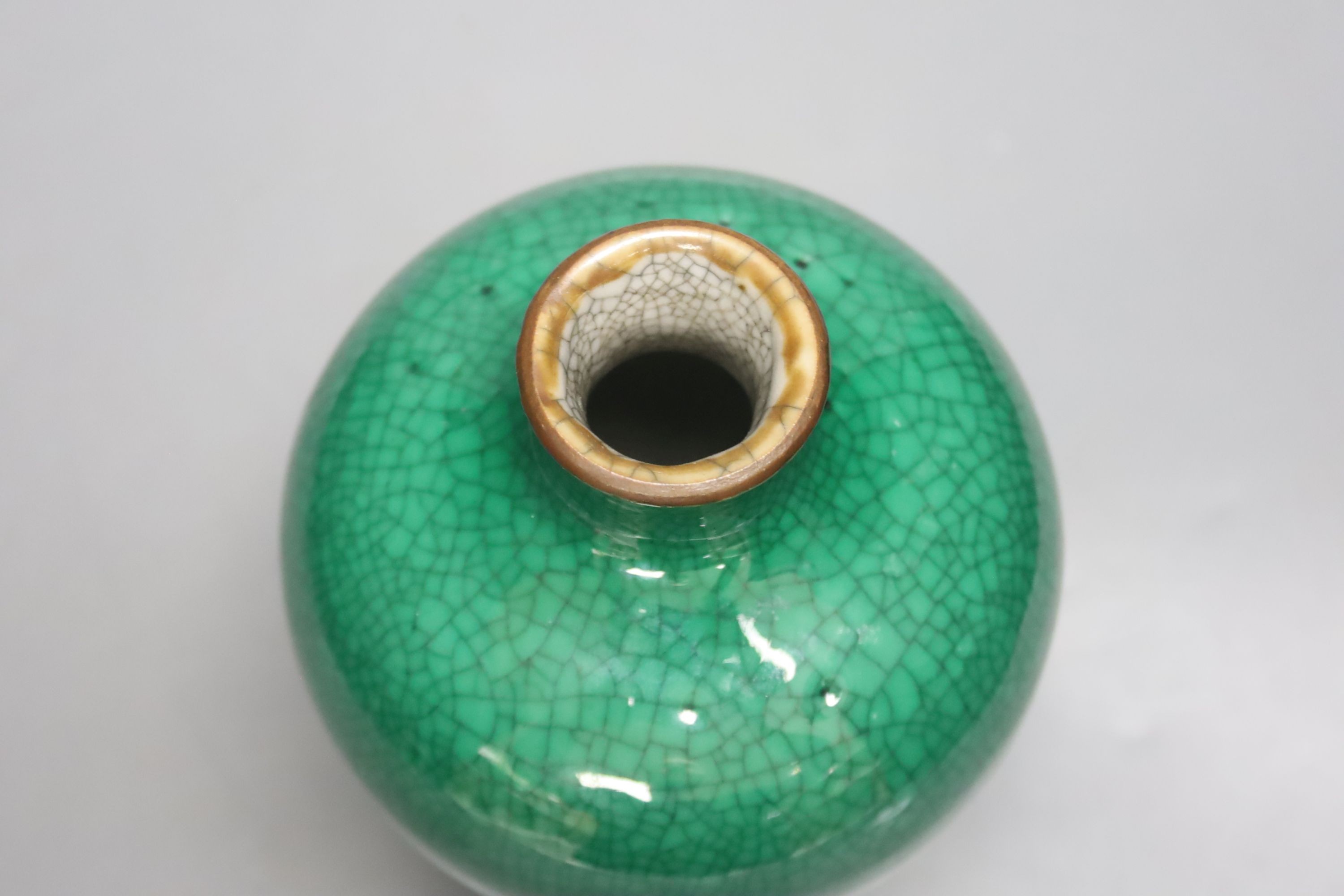 A Chinese green ground crackle glazed porcelain baluster vase, height 19cm